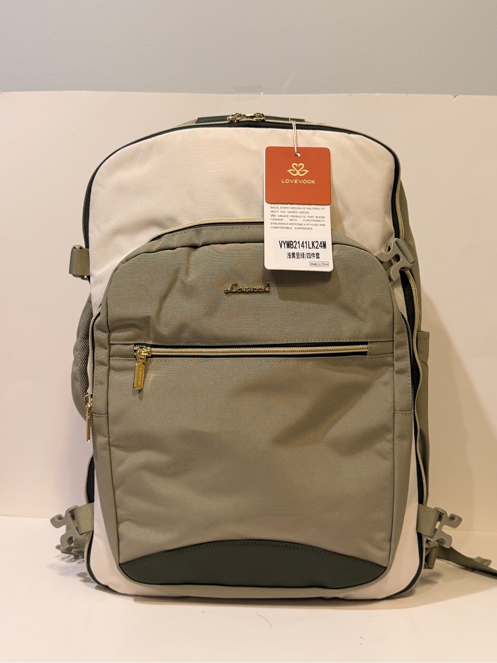 NWT Lovevook Travel Backpack in Cream and Olive Green color